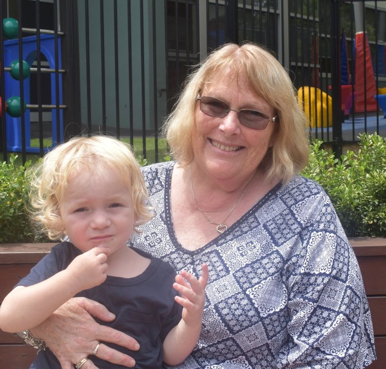 Grandson and Grandma smiling 