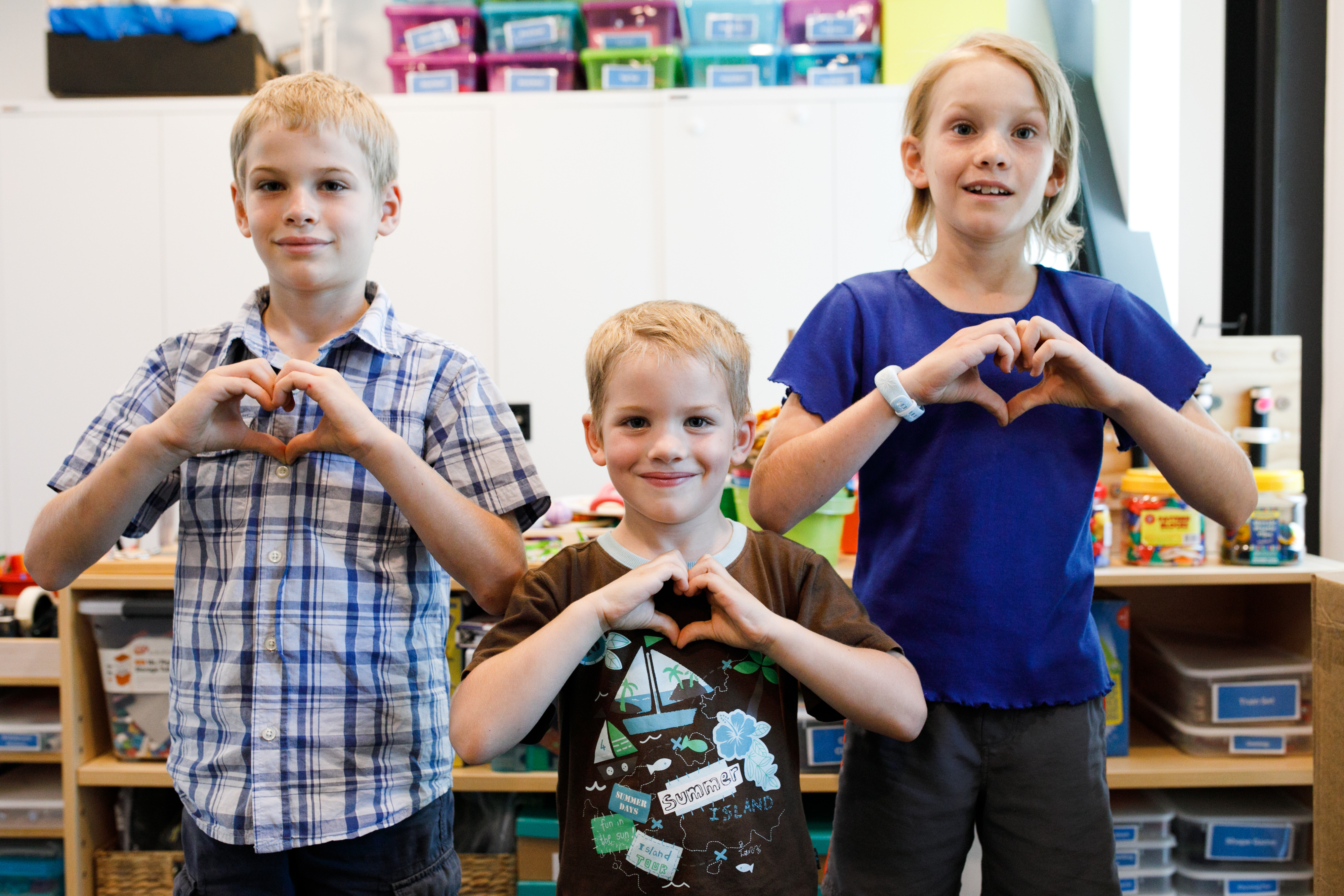 Photo of RMHC WA kids with 'love heart' hands